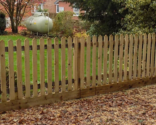 Palisade Fencing with Gravel Board