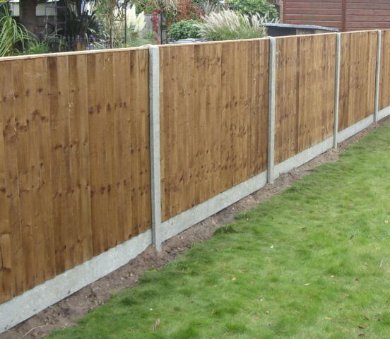 Closeboard panels with concrete posts and gravel boards