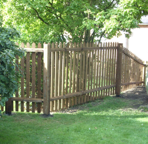 Taller Palisade fencing with a slope