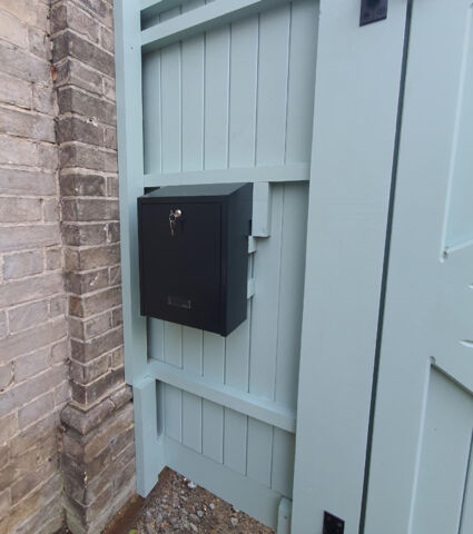 Letter box on a side panel