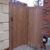 Glemham gate and side panel in Oak finished with Rubio Teak