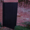 Glemham gate painted with black barn paint