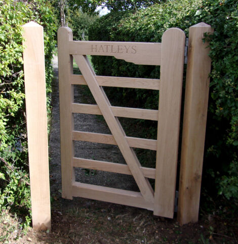 Melford hand gate in Oak with lettering
