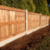 Back of Closeboard panels with concrete posts and gravel boards