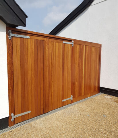 Blyth gates and side panel in oiled Iroko