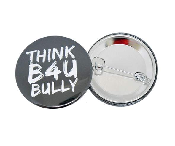 Message on a 38mm button badge with a safety pin