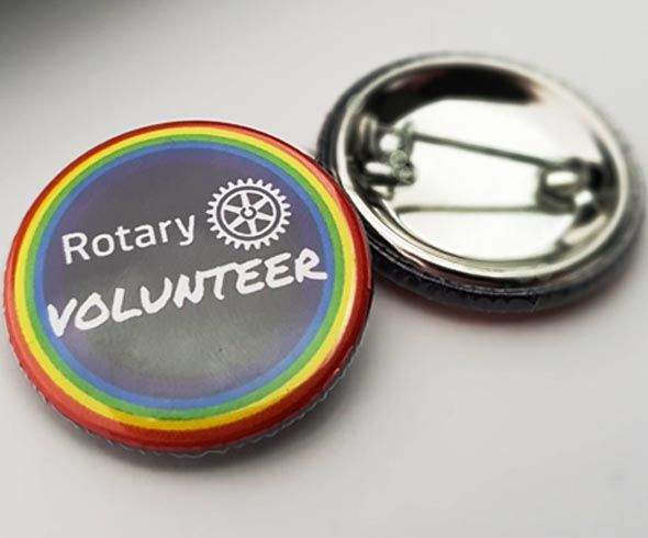 32mm diameter Rotary Volunteer badge with safety pin