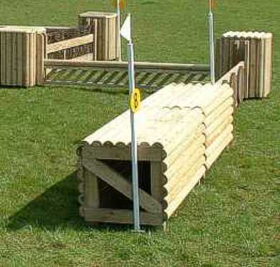 Log wall used with XC system