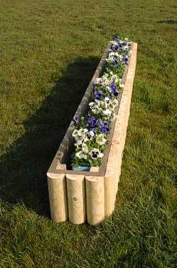 Log extender shown here filled with flowers